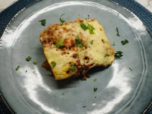 tepsis sertésragu krumpli ágyon recept